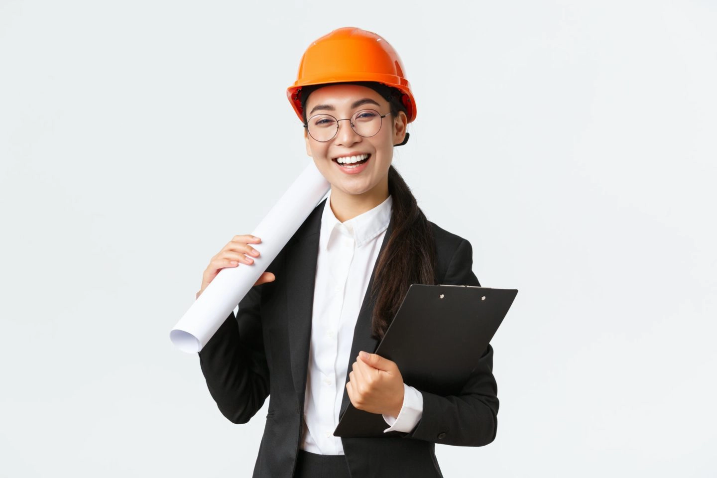 Professional happy asian female architect construction engineer in helmet and business suit holding e1600416936843