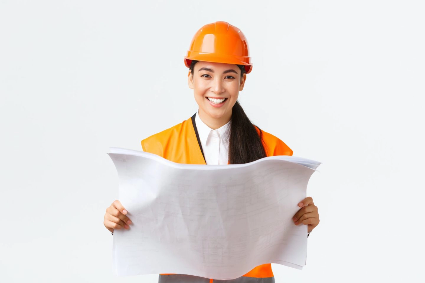 Smiling pretty asian female architect industrial woman in safety helmet and reflective jacket e1600416965396